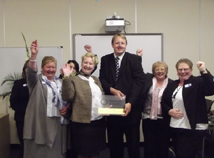 Toby Perkins MP with staff from One to One Support Services