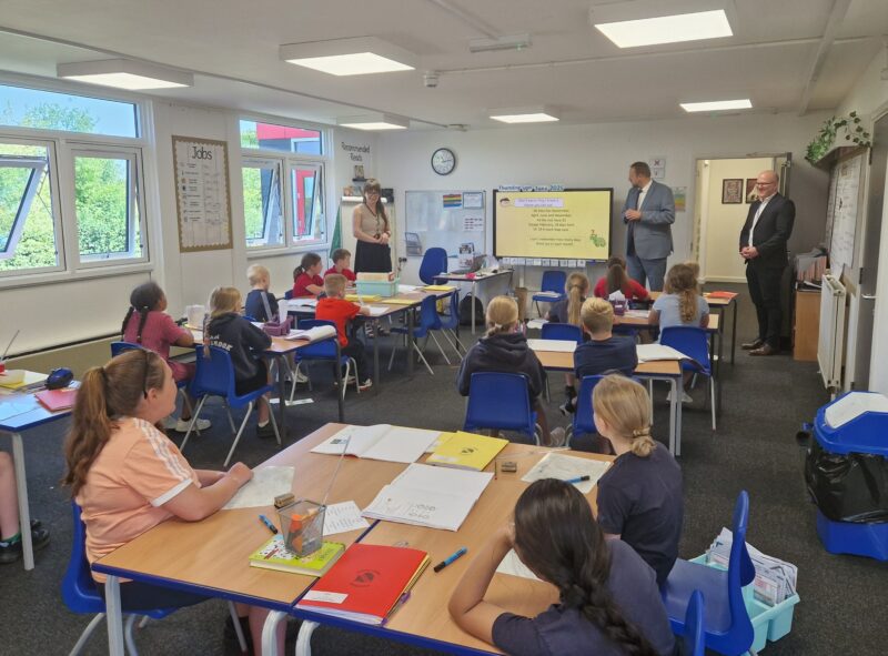 Toby speaking to pupils at Poolsbrook Primary School