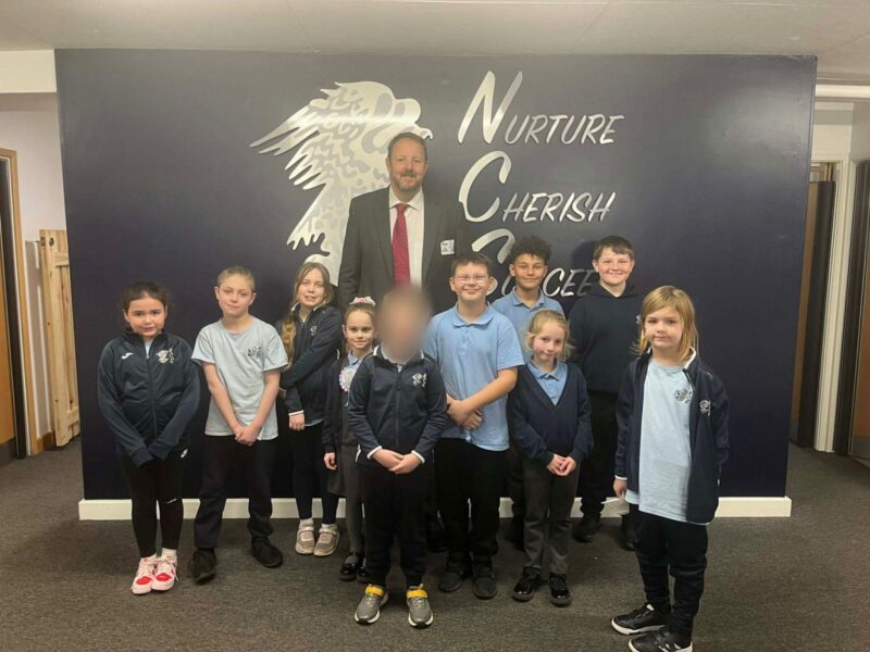 Toby with Newbold Primary pupils